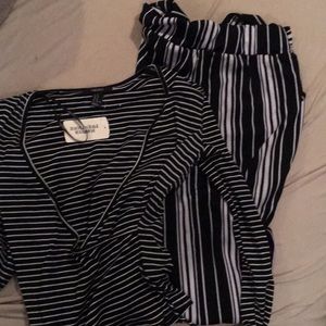 Black and white striped knit wrap top